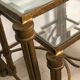 Vintage 80'S trundle table in patinated gilded wrought iron top beveled glass