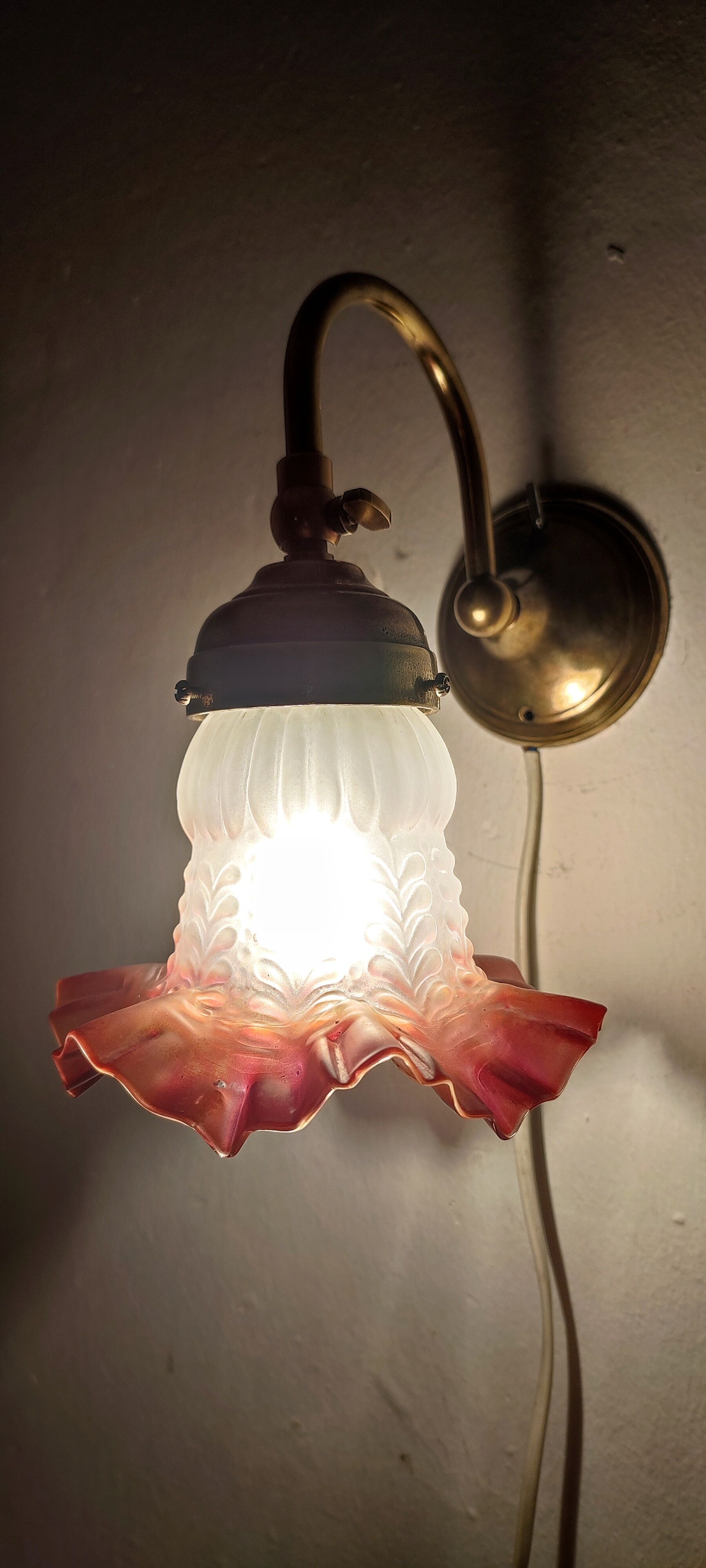 Bronze and glass wall lamp. Spain, 1940s.