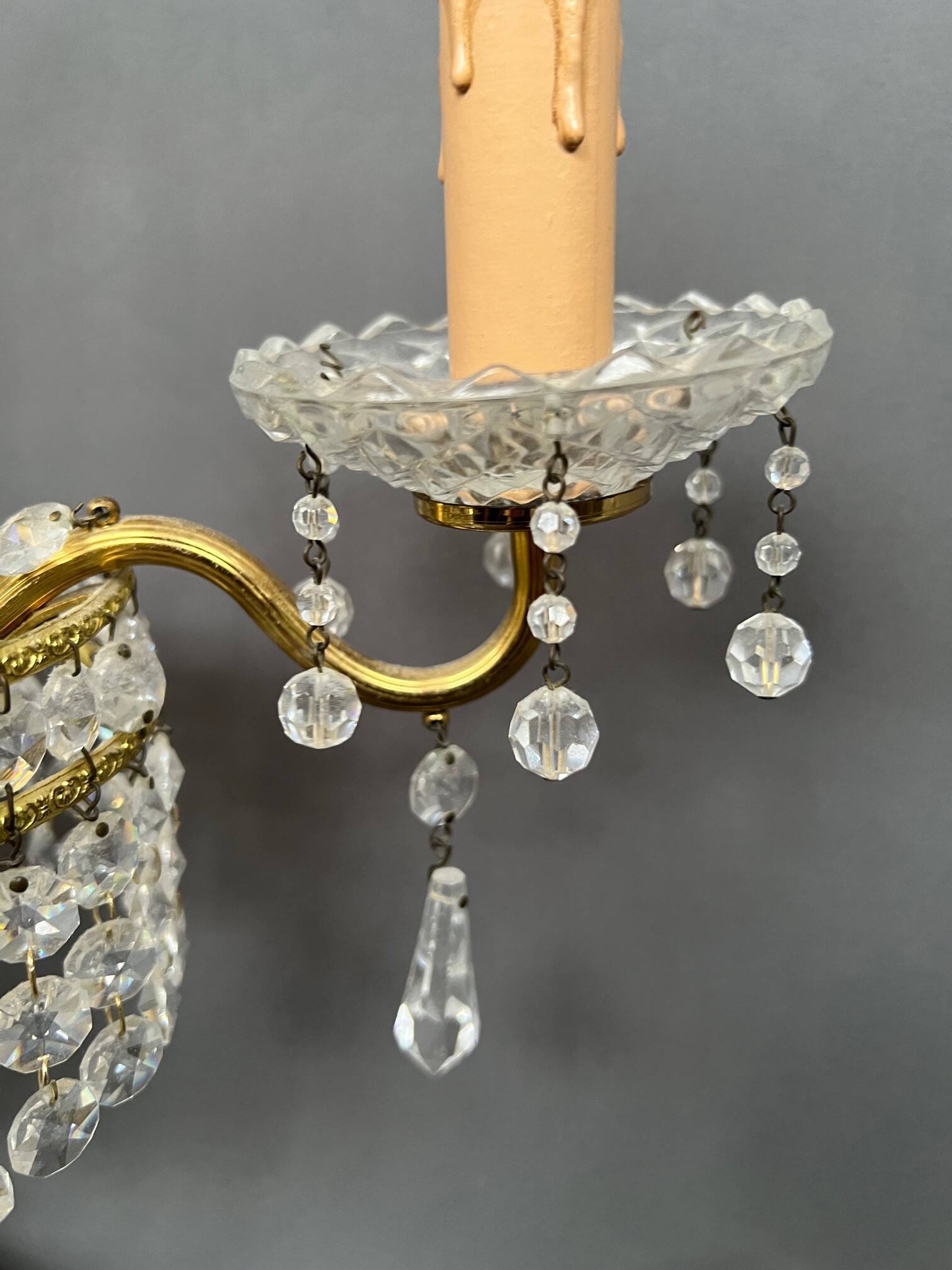 Girandole. Brass, crystal, bronze.