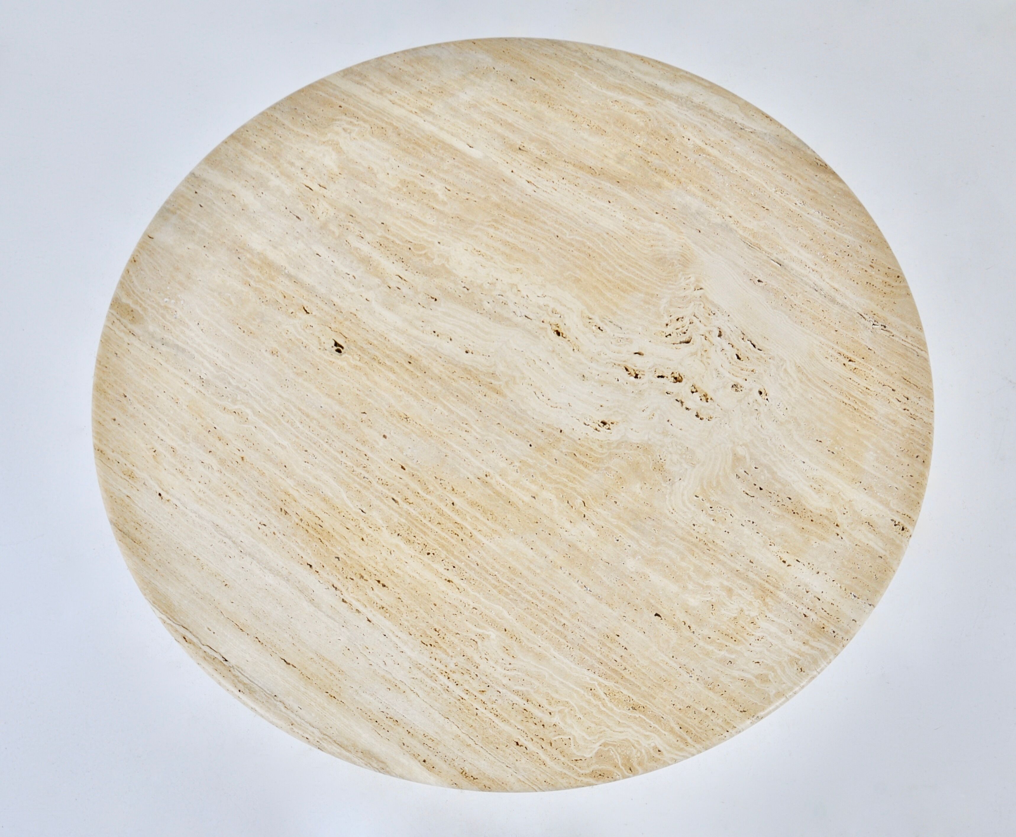 Circular travertine dining table