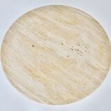 Circular travertine dining table