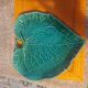 Green ceramic leaf-shaped dish