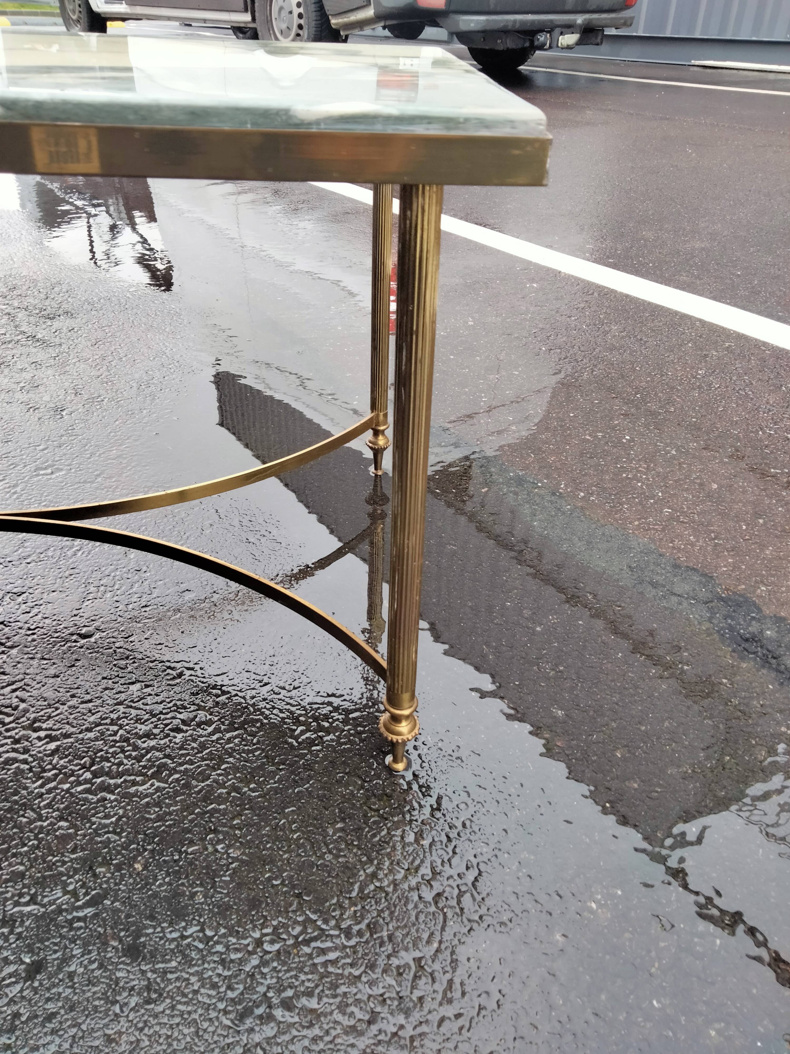 Old vintage gilded side table with marble top