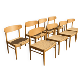 8 dining chairs in oak  w/ paper cord