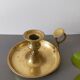brass candle holder with old cellar rat thumb