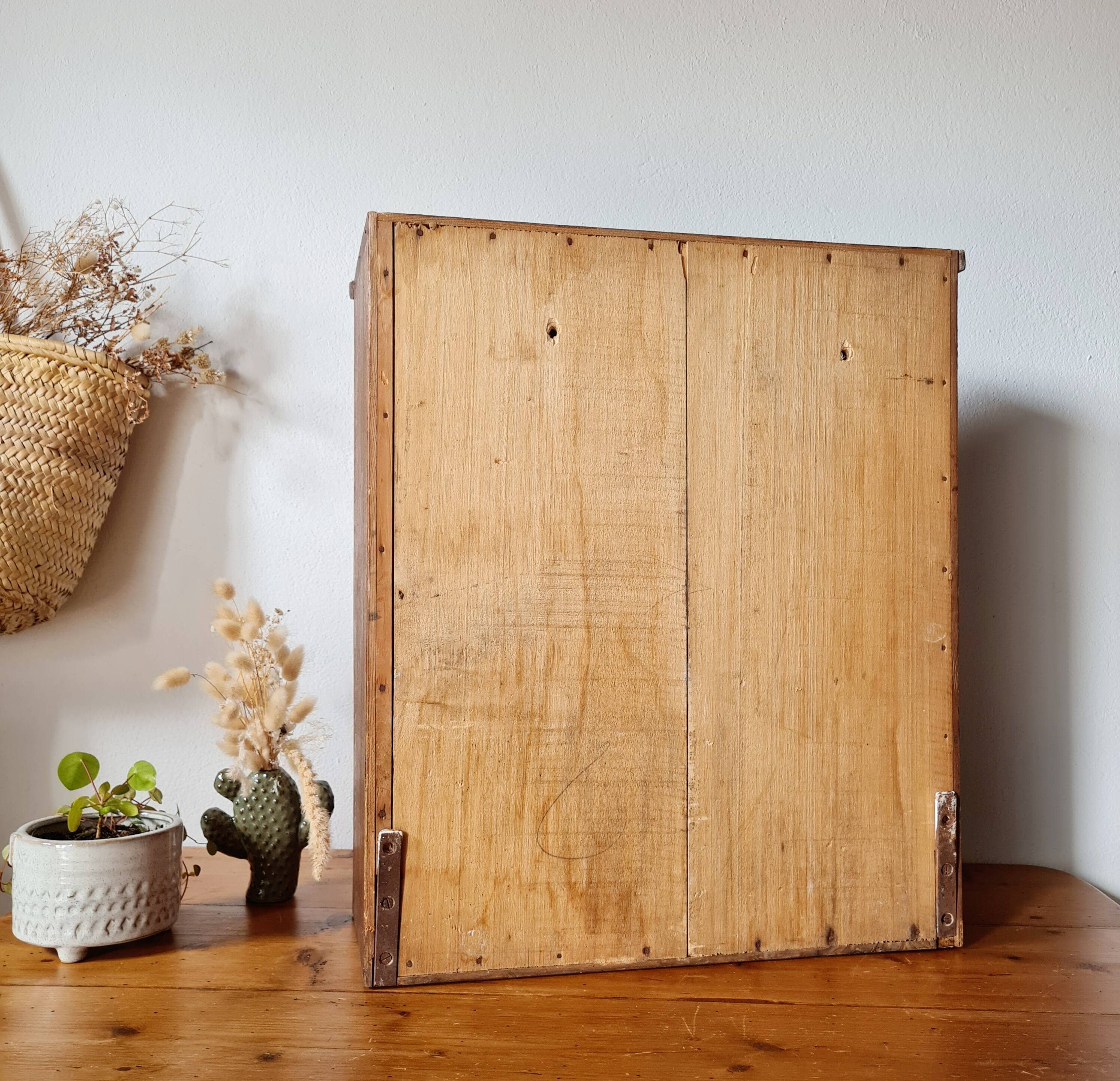 Vintage wooden medicine cabinet from the 1950s.