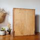 Vintage wooden medicine cabinet from the 1950s.