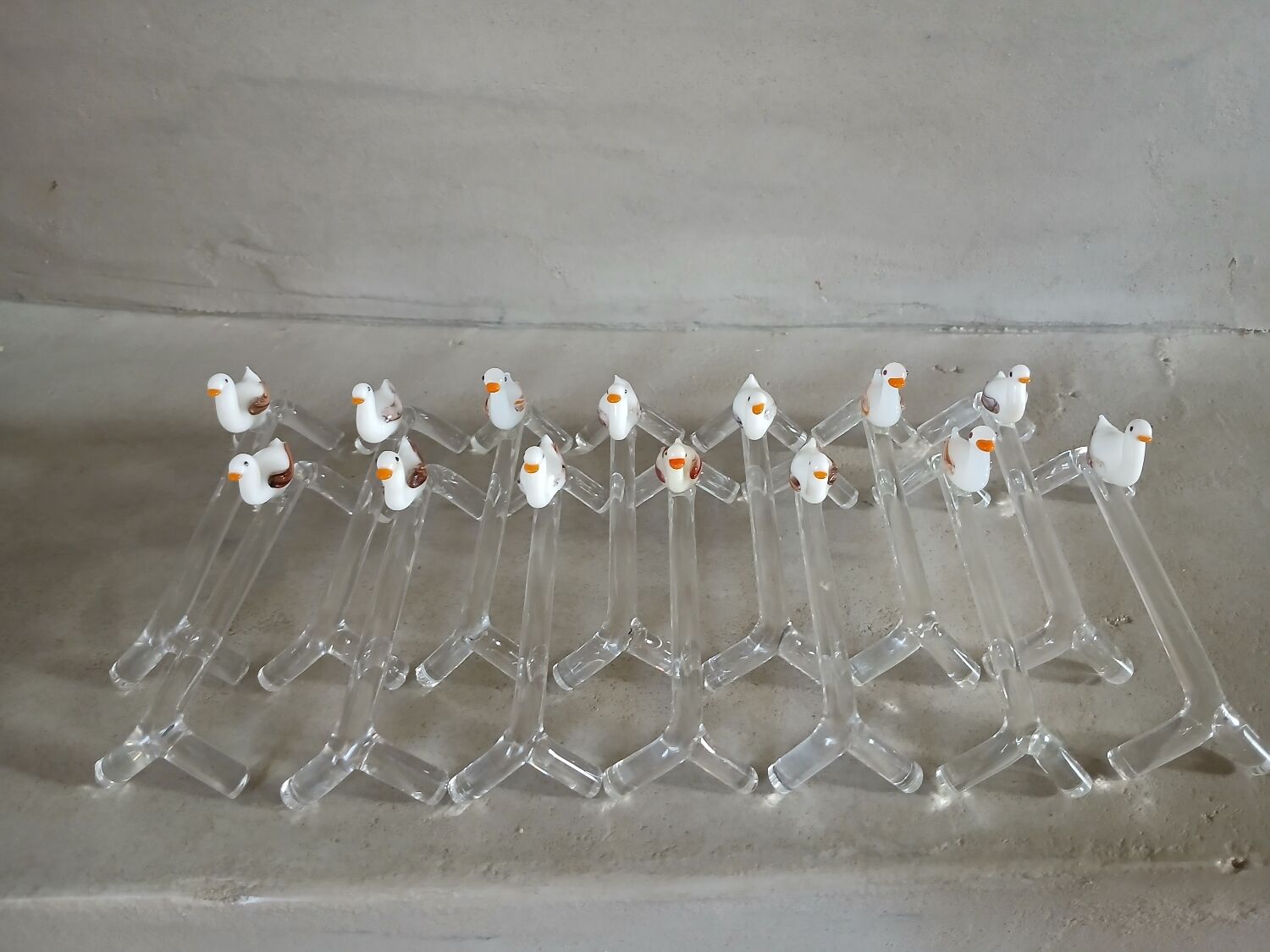 14 antique glass knife rests / ducks