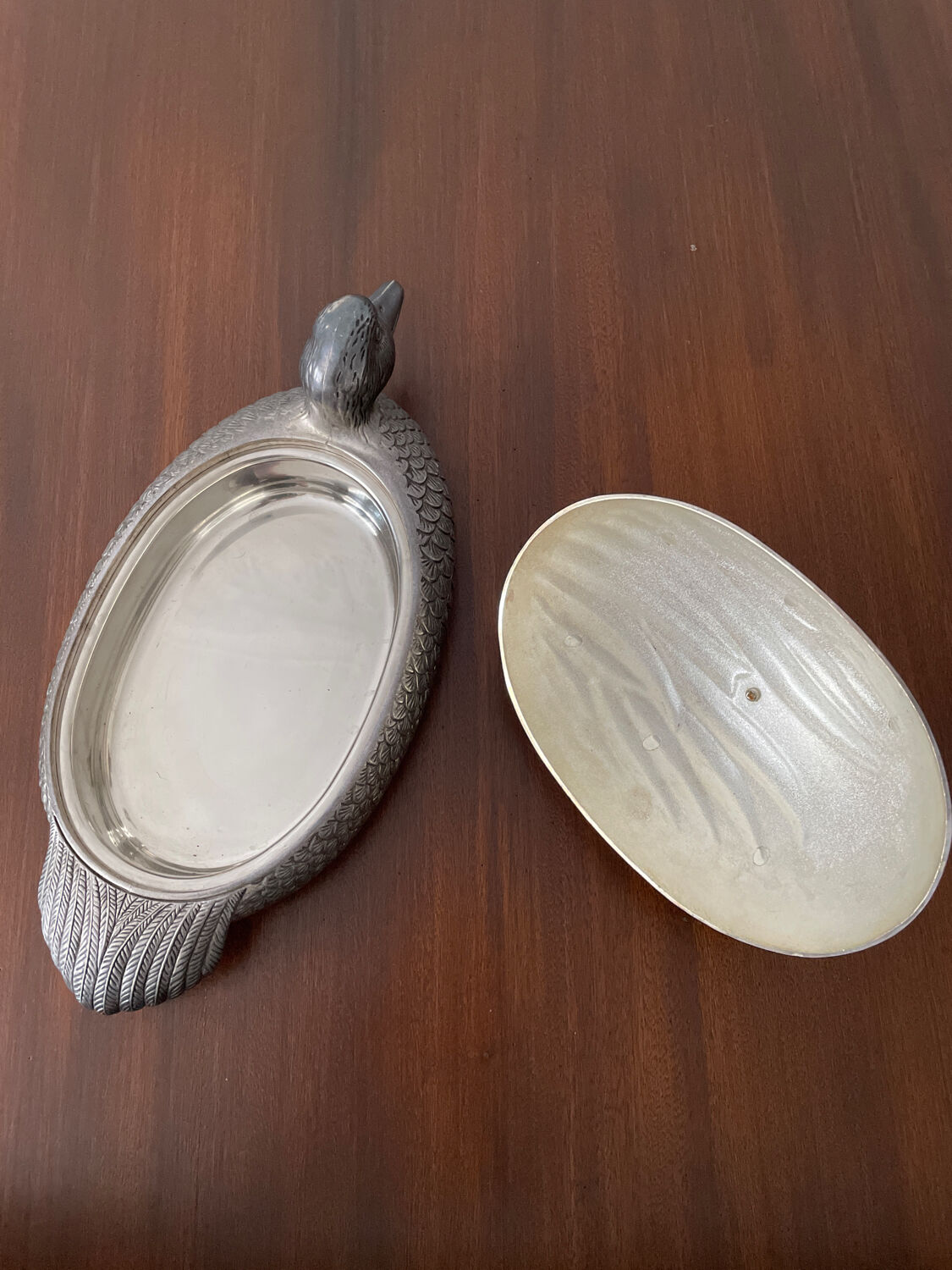 Serving dish with bell in silver metal shape duck