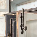 Display cabinet in patinated wood