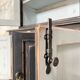 Display cabinet in patinated wood