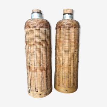 Set of 2 old insulated bottles in braided wicker