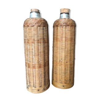 Set of 2 old insulated bottles in braided wicker