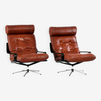 Pair of leather lounge chairs