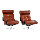 Pair of leather lounge chairs