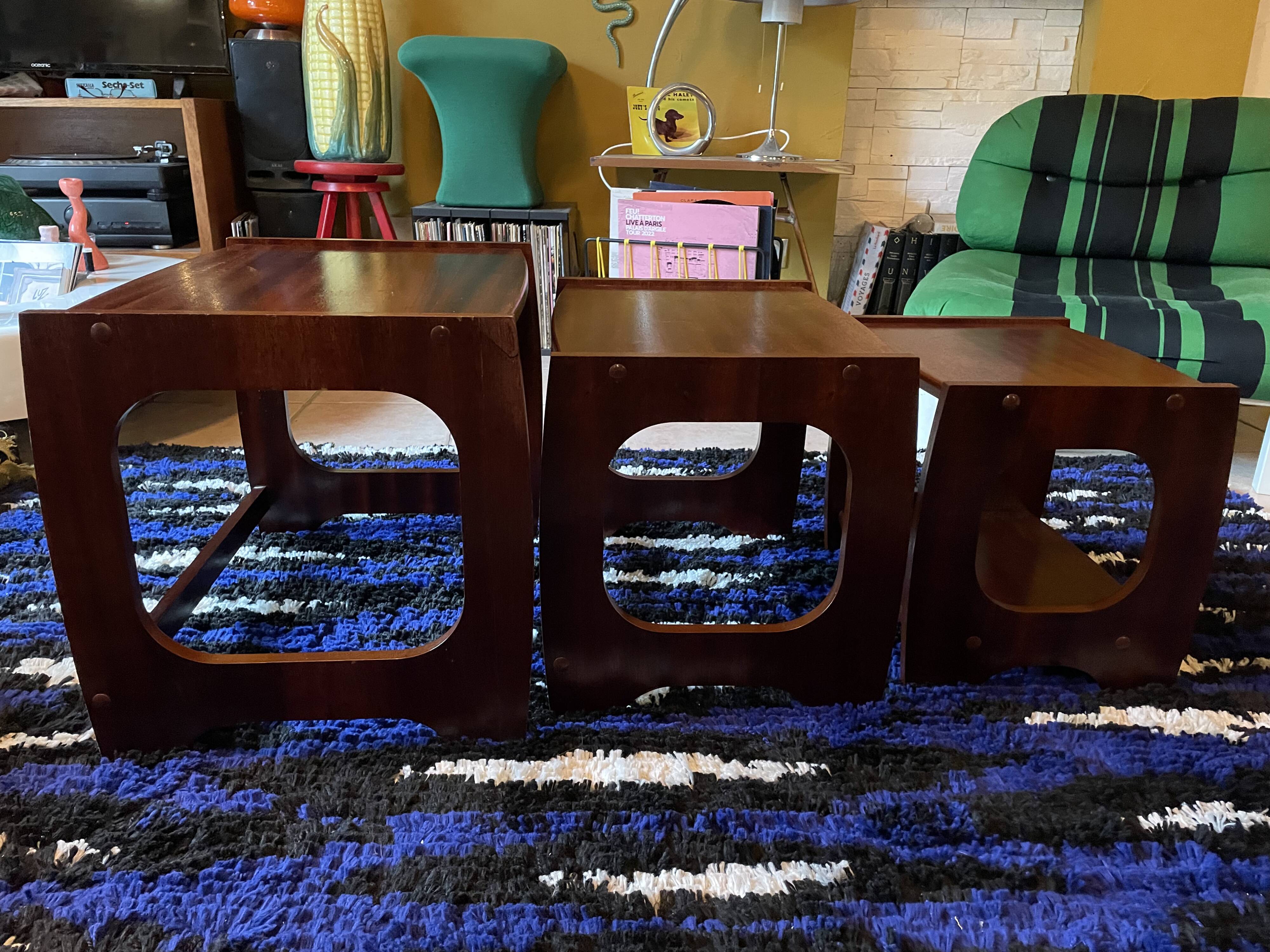 Set of three nesting coffee tables, 1970, dark wood.