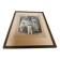 Large frame old photograph of a trio of communicants.