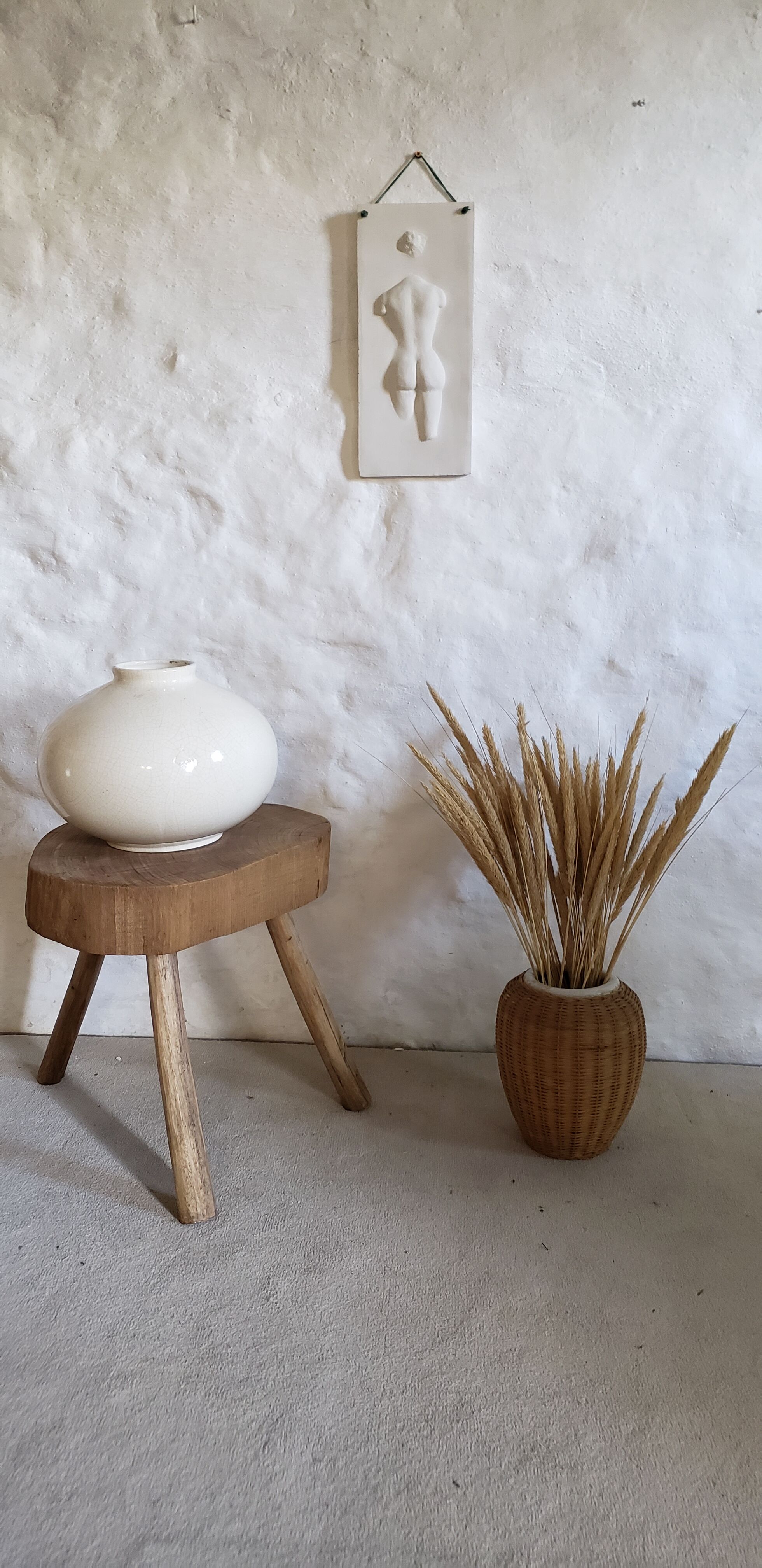 Sandstone and rattan vase