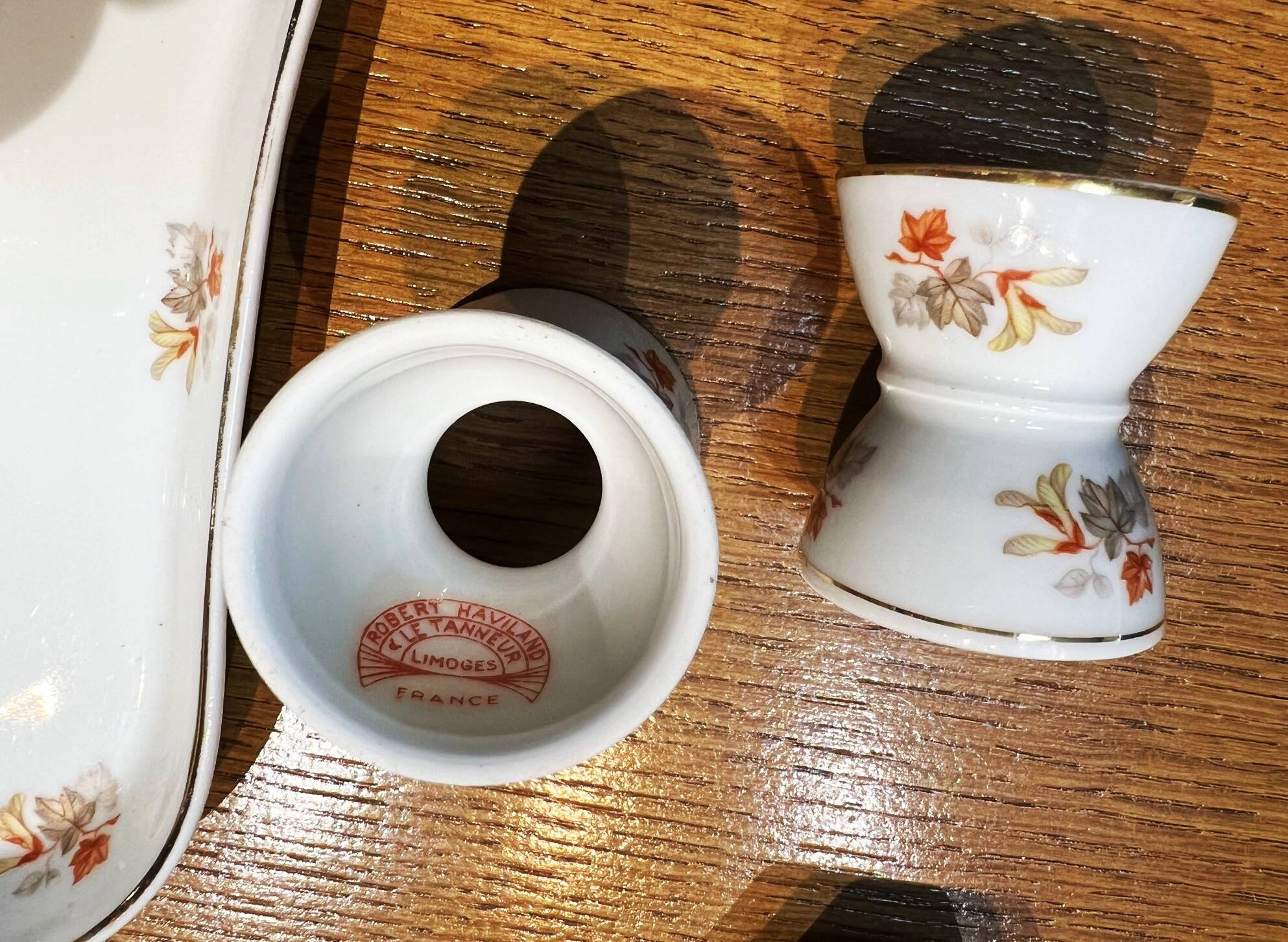 Service of 10 diabolo egg cups, 2 salt cellars and Haviland porcelain tray and