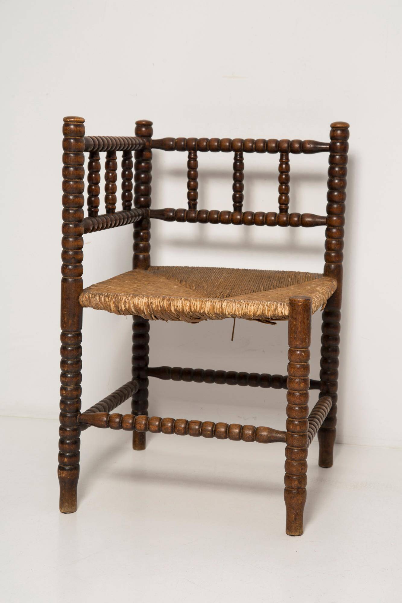 Provincial antique bobbin corner chair from the mid-century, France, 1940s.