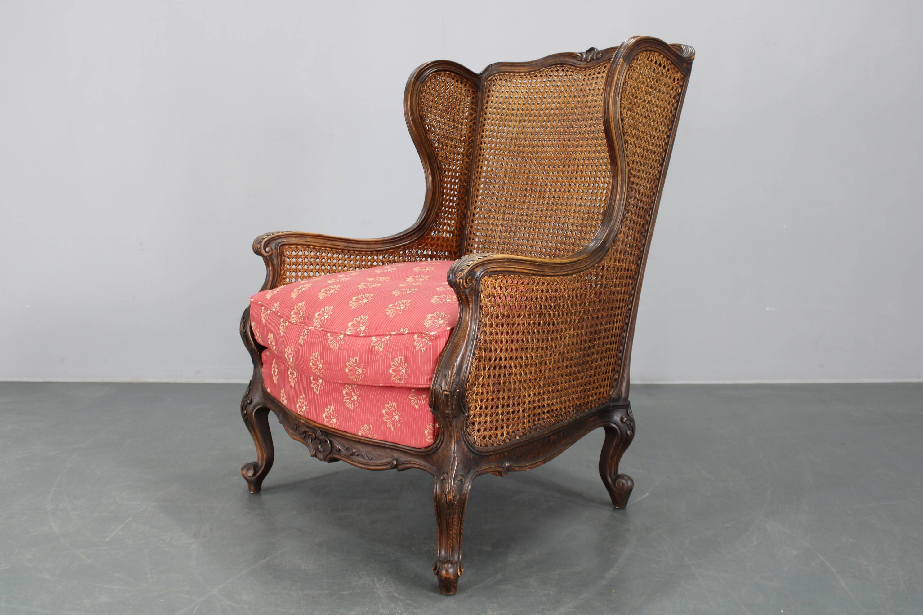 Antique Carved Wing Chair with Cane Sides , Czechoslovakia