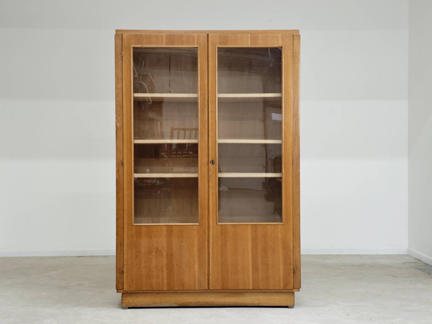 Oak glass-fronted school cabinet 1960