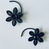 Pair of iron water lily candle holders