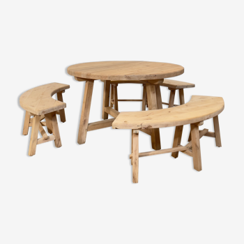 Round table and vintage wooden benches 1960