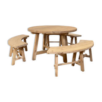 Round table and vintage wooden benches 1960