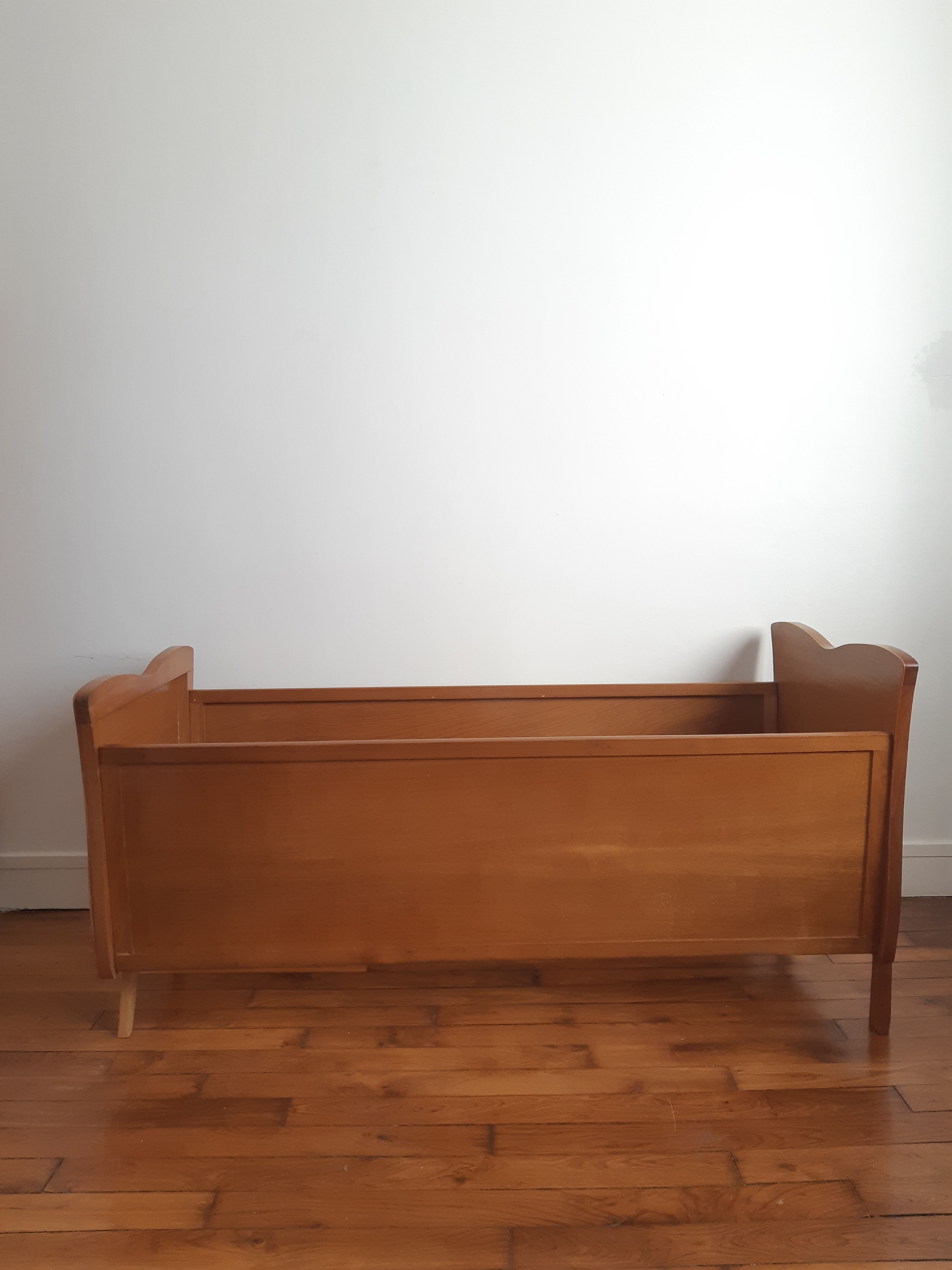 Wooden bed and vintage rattan