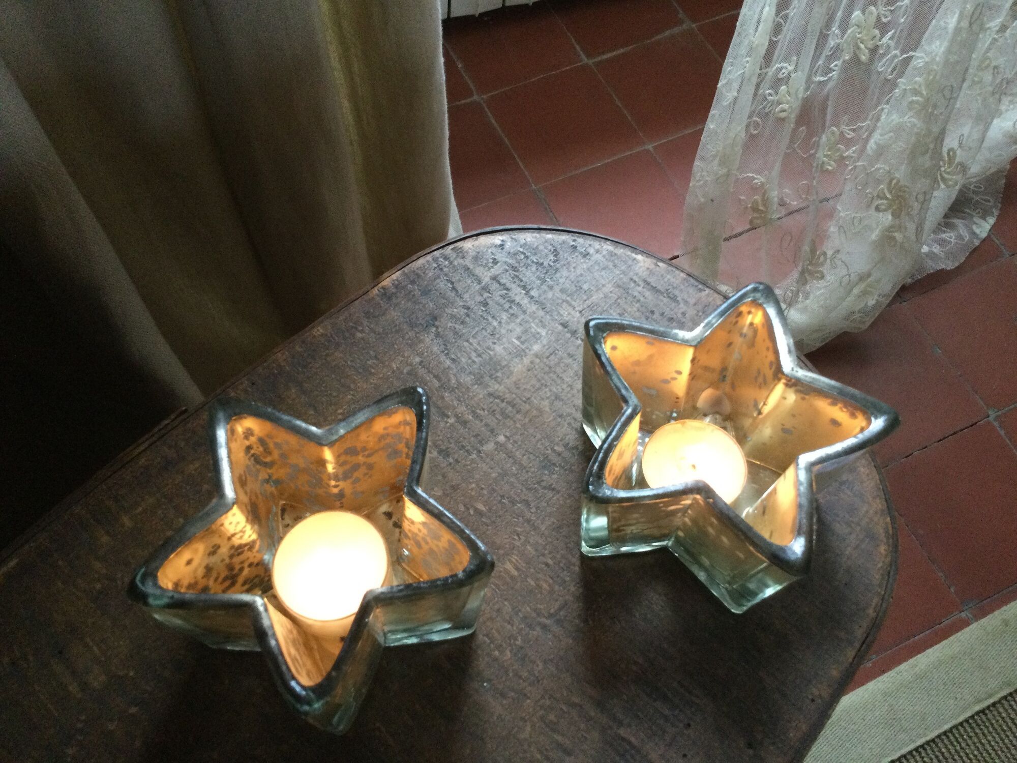 Pair of mercurized glass candle holders in the shape of stars