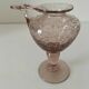 Biot candle holder vase in powder pink blown bubble glass.