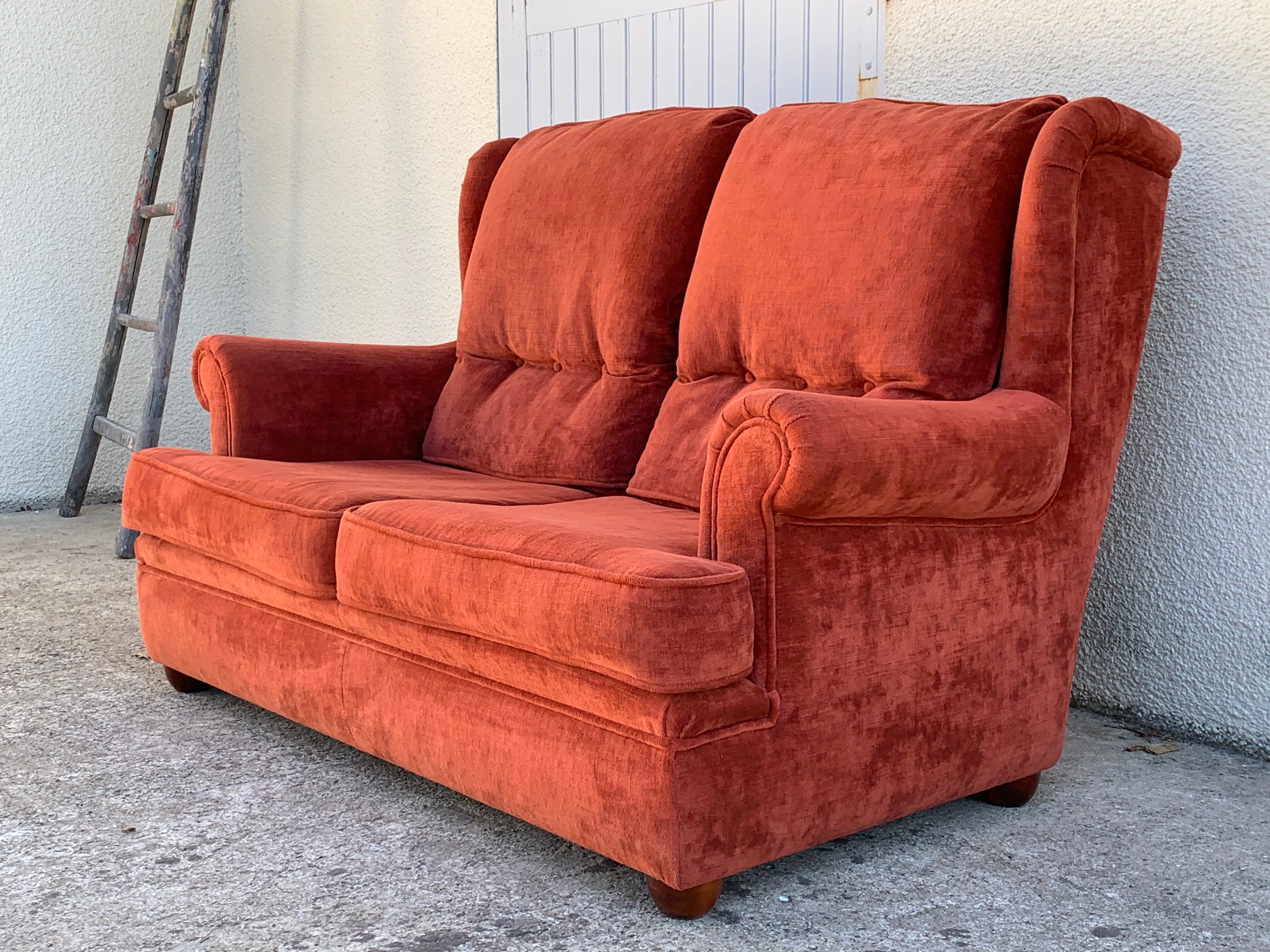 Coral velvet toad sofa