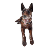 Enamelled lying dog