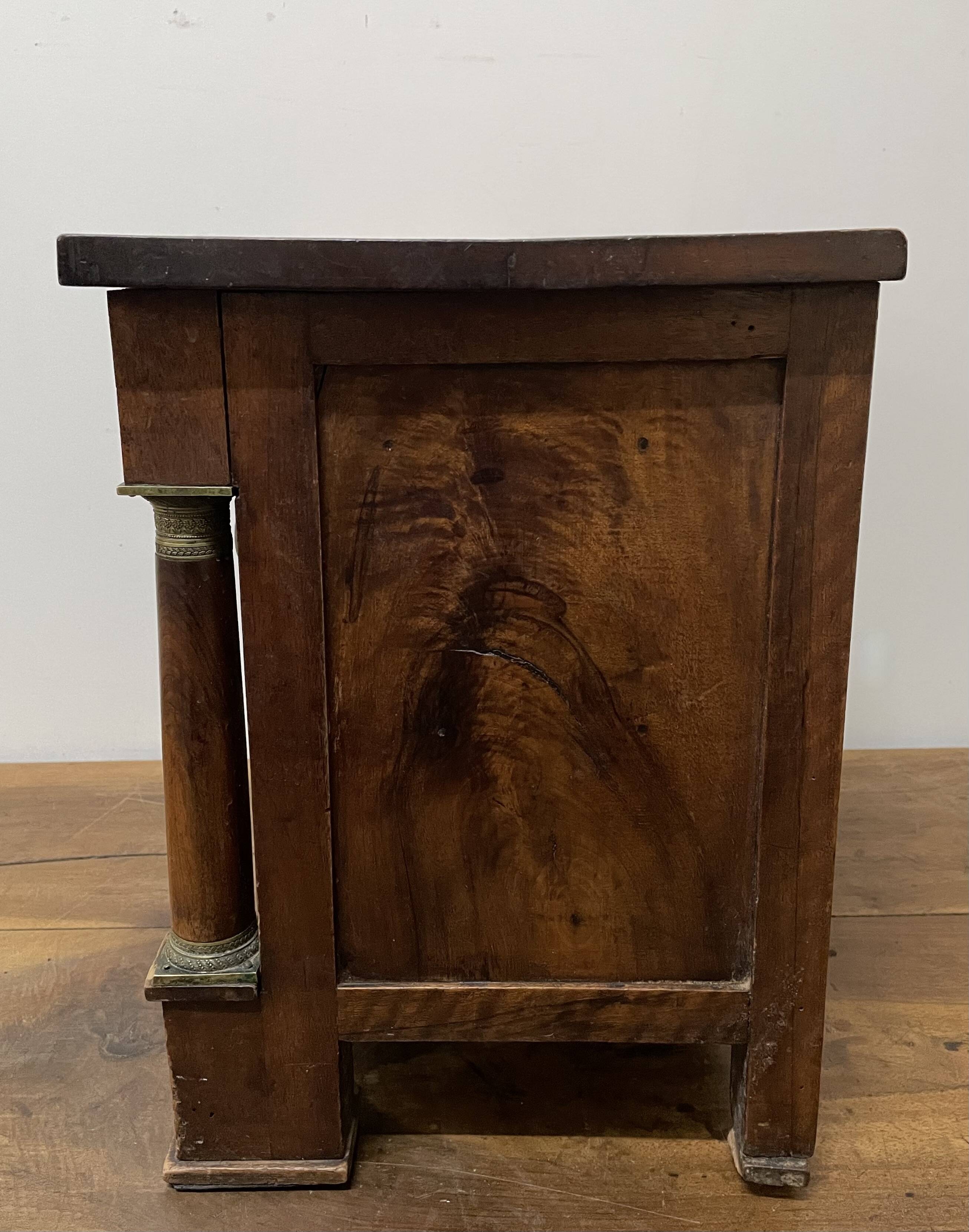 19th century Empire style walnut chest of drawers. It opens with 3 drawers in