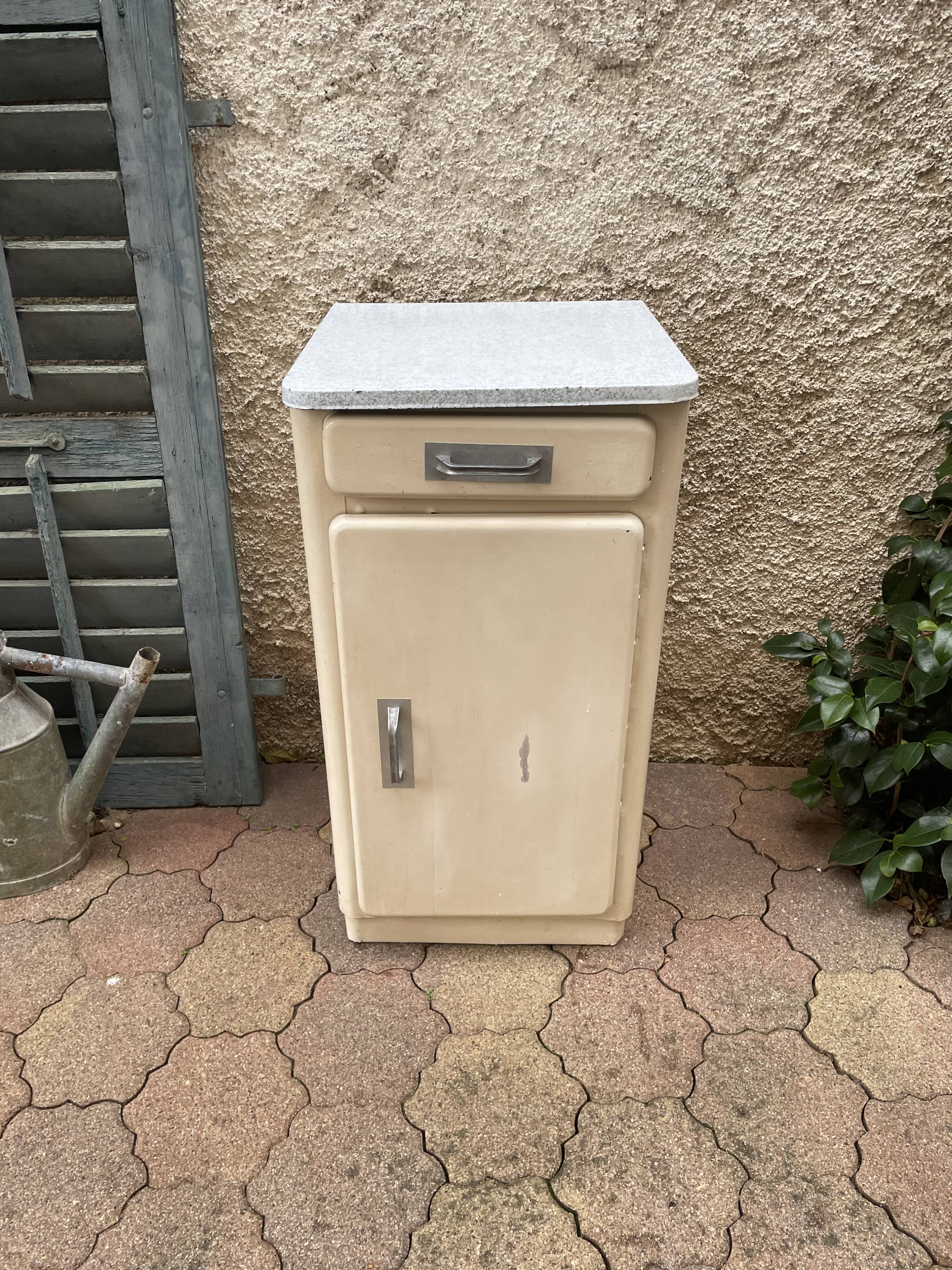 Furniture stored bottle in enamelled sheet metal