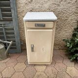 Furniture stored bottle in enamelled sheet metal