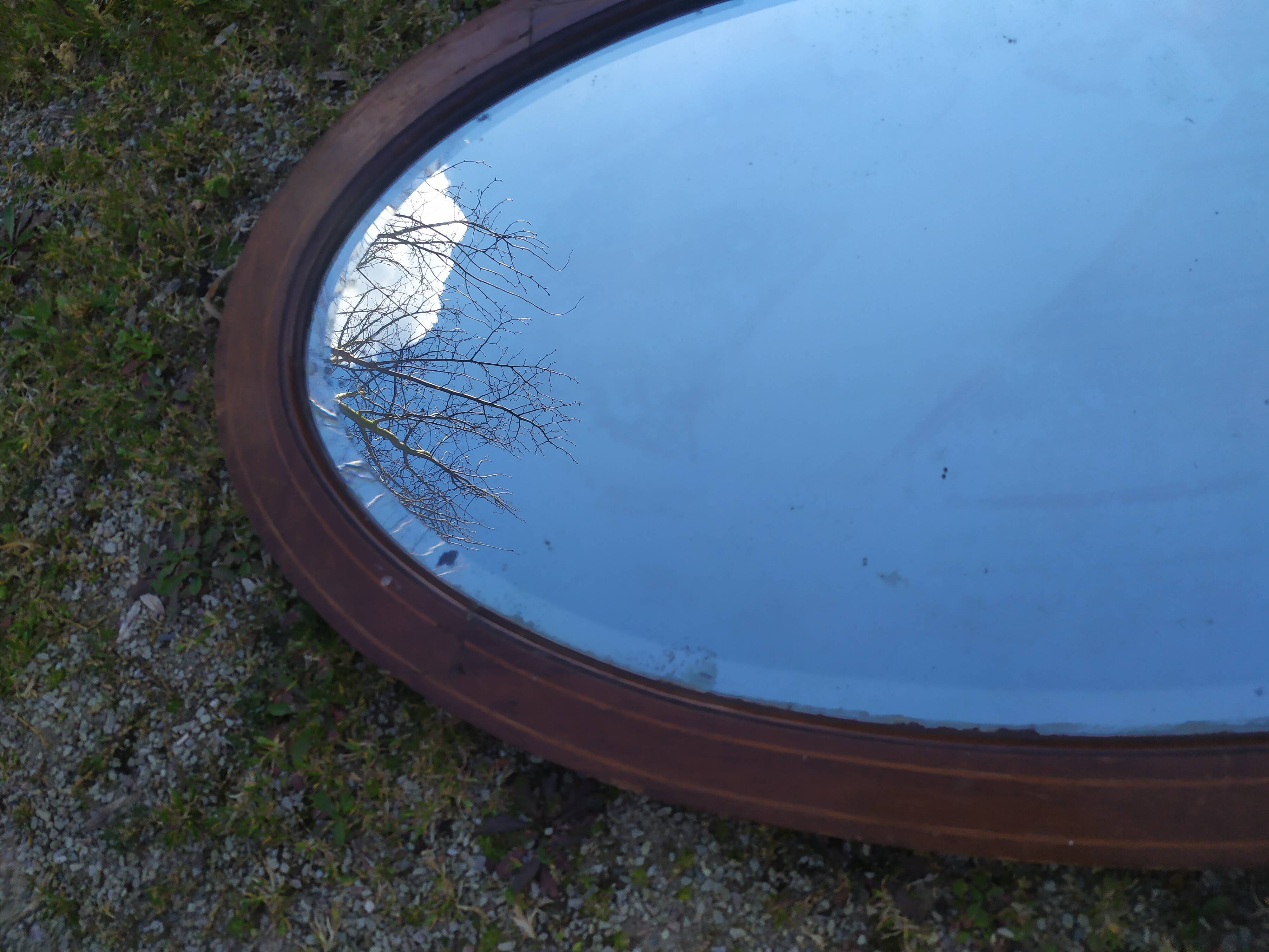 Beveled oval mirror 83x52cm