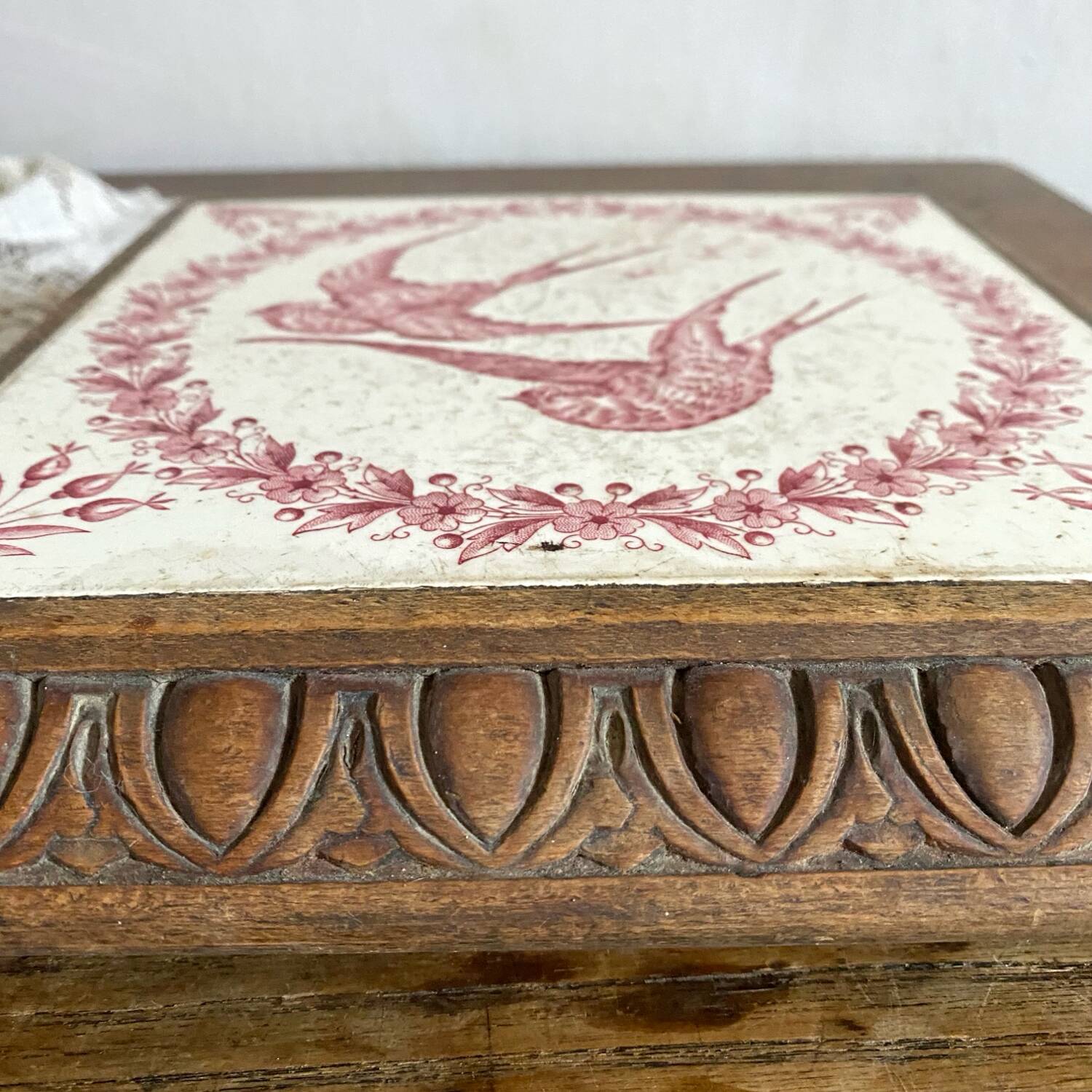 Ironstone trivet with birds