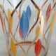 Glass ice bucket, metal spoon and vintage bakelite