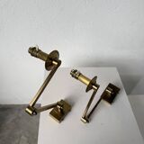 Pair of brass wall lights with articulated arms from the 70s