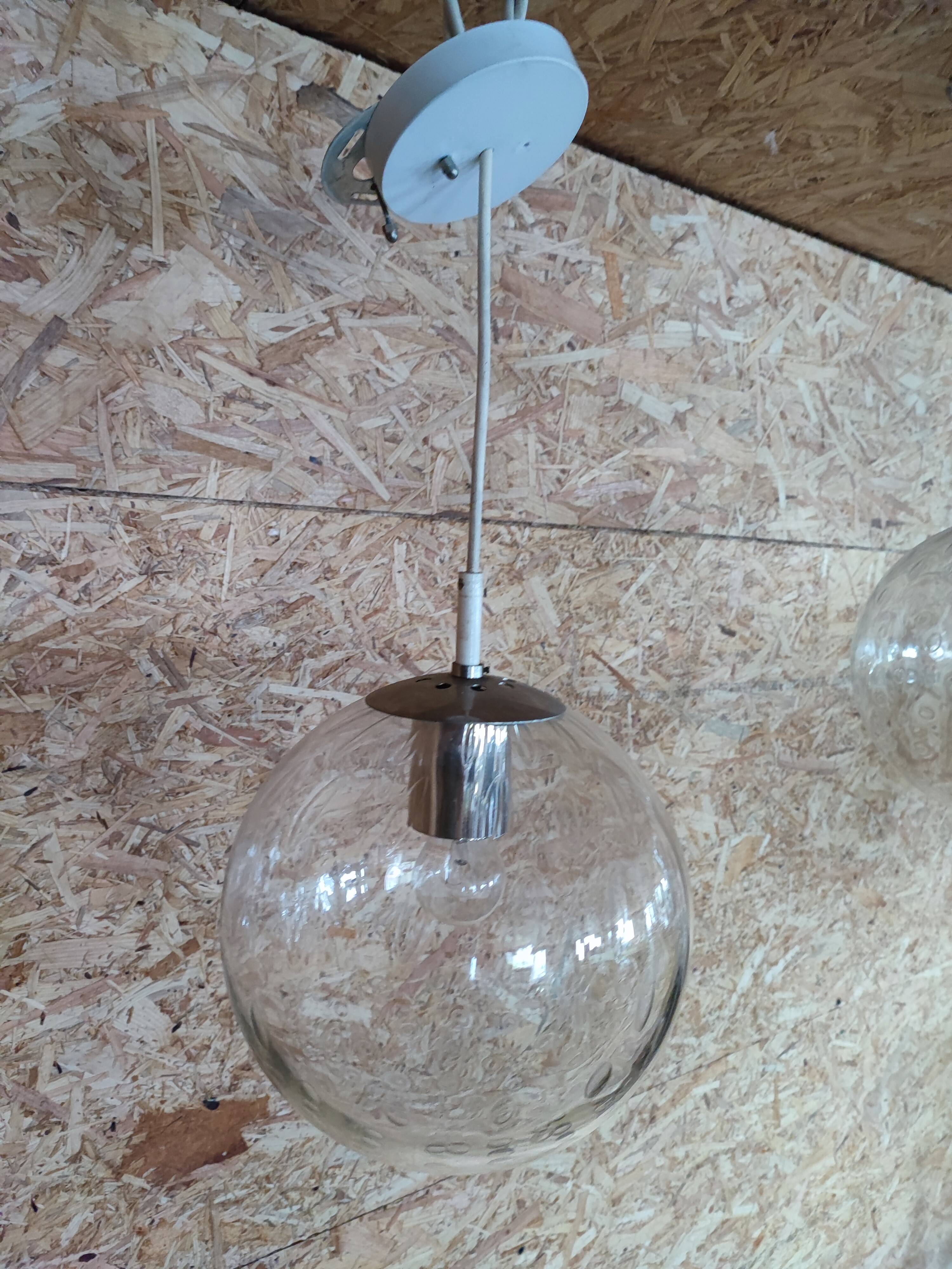 Bubbled glass globe pendant light. RAAK Amsterdam