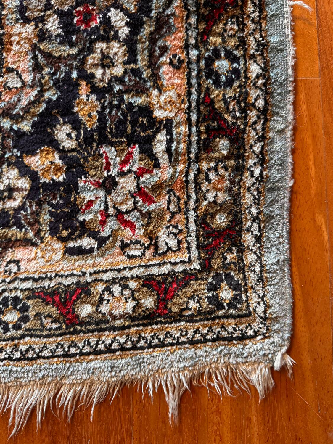 Antique Ghoum carpet from Iran in silk.