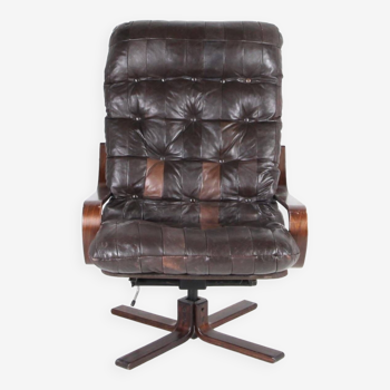 Vintage armchair in wood and leather