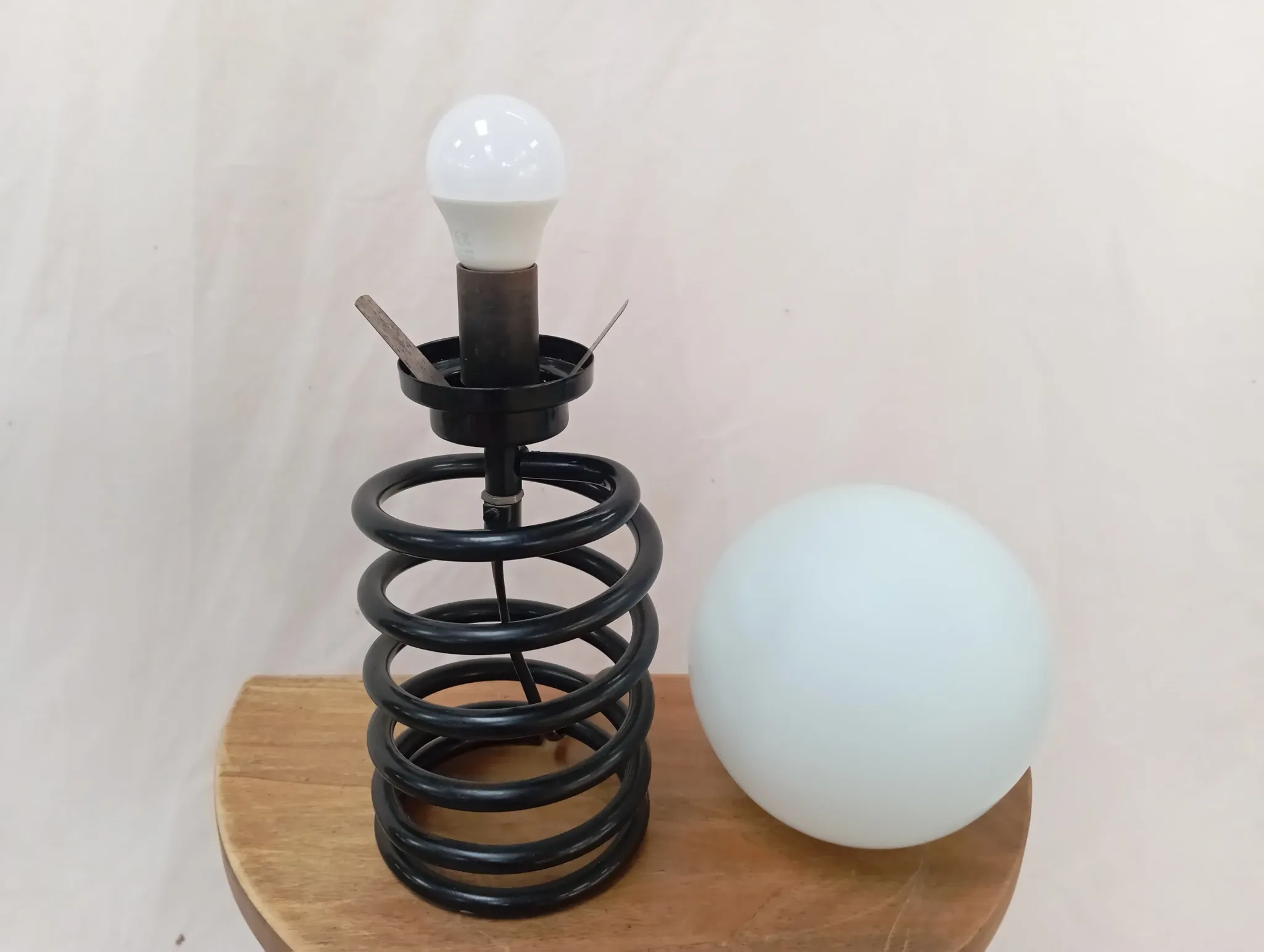 Spring lamp from the 1980s, design by Ingo Maurer.