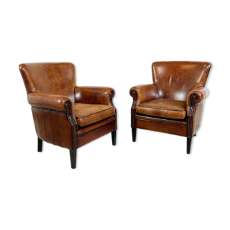 Set of two vintage sheep leather armchairs by loung atelier