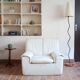 Cinna armchair in cream leather, bolstered armrests, 1970s.