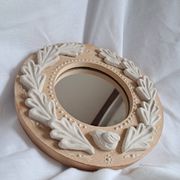 Red and white stoneware mirror, oak leaves