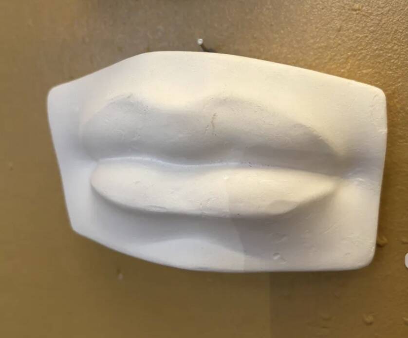 Nose and mouth in plaster of David by Michelangelo
