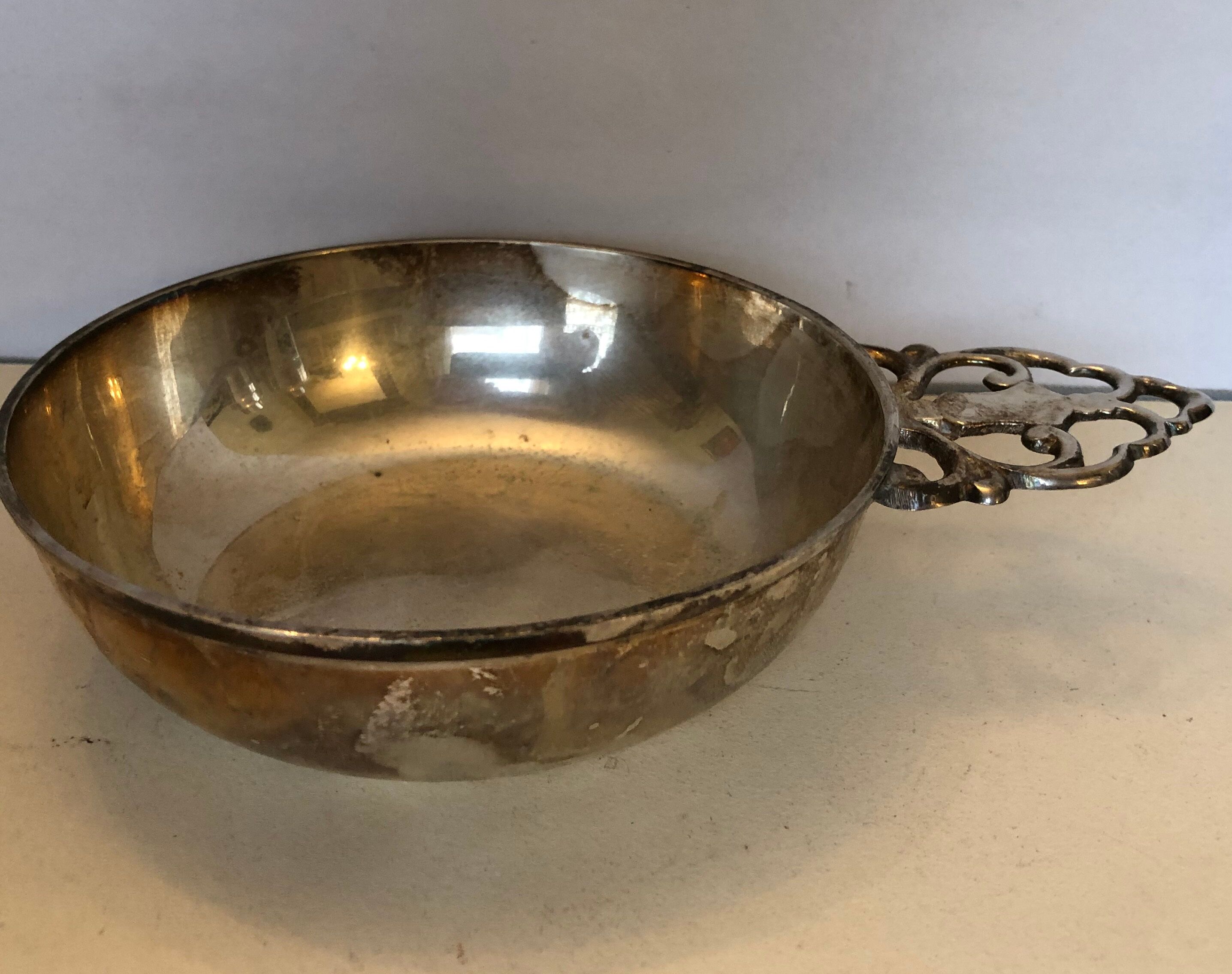 Silver metal tastevin